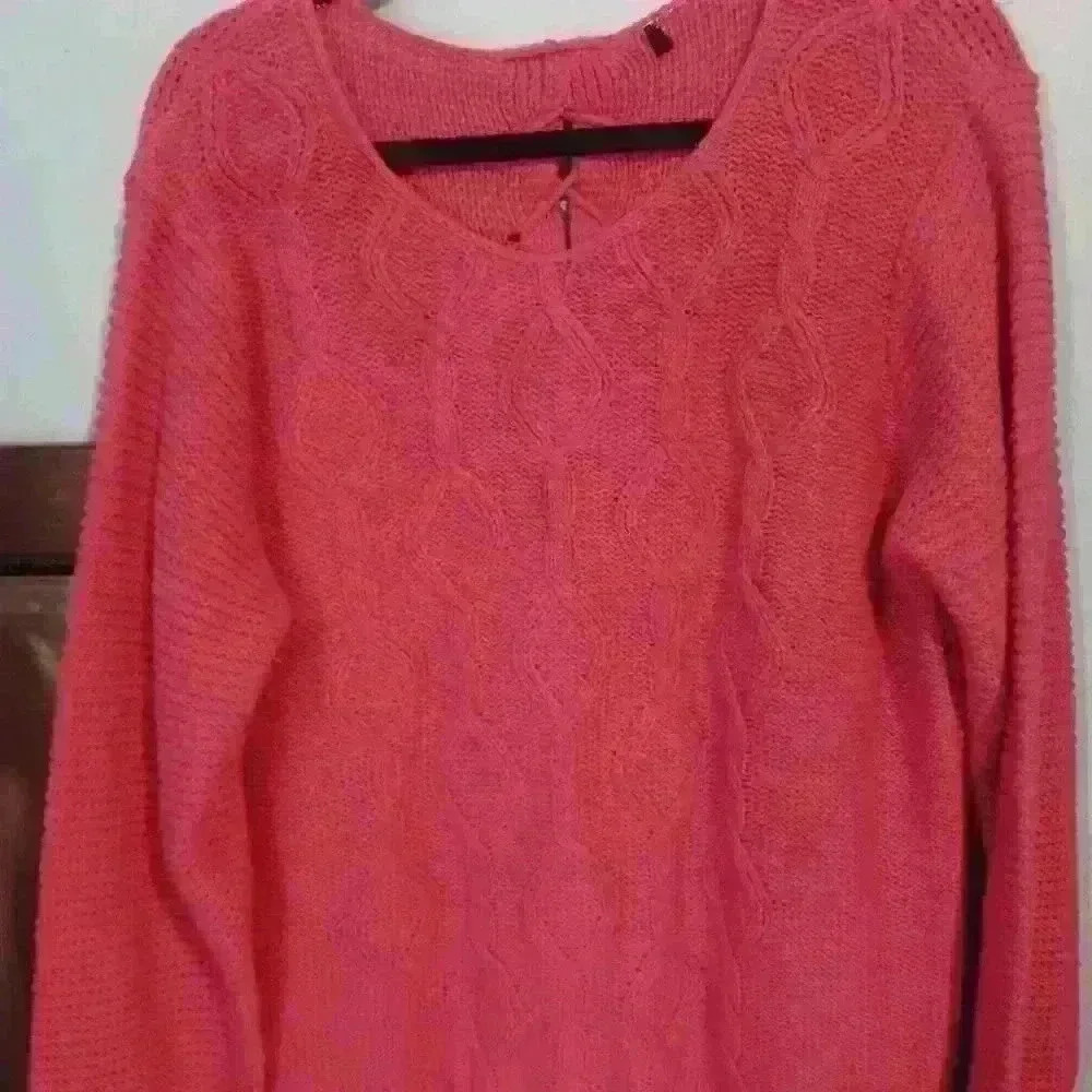 pink heavy cable knit sweater